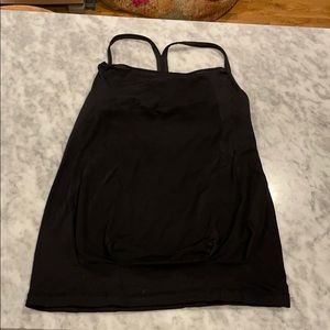 Black open back tank with built in bra.